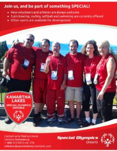 special-olympics-team-standing-together-dressed-in-red-and-wearing-medals