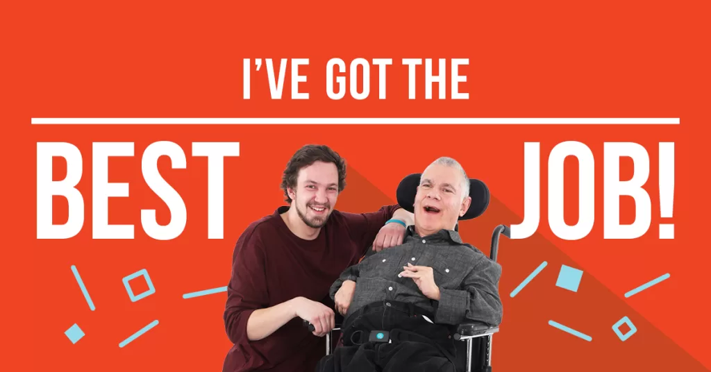 Promotional marketing banner on a solid orange background with the large white text 'I'VE GOT THE BEST JOB!' split down the middle. In the center, a smiling young man with dark hair and a beard, wearing a maroon long-sleeve shirt, leans forward happily next to an older, smiling man in a high-back wheelchair who is wearing a grey button-down shirt. Scattered light blue geometric confetti lines and squares accent the bottom corners.